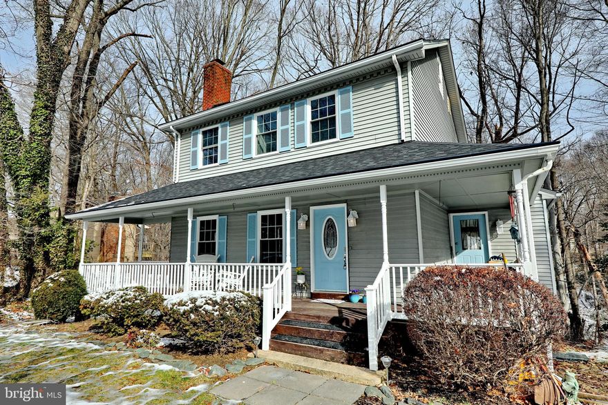 Fresh Paint and New Carpet completed in Jan 2024!  New Septic to be installed 2024.  

This charming Colonial home is located in the sought after Apple Greene Community in beautiful Northern Calvert. Enjoy peaceful wooded surroundings without a lot of yard work!  There's a beautiful bed in the front to plant your flowers/herbs.  Enjoy your morning coffee on the large wrap around porch.  The composite deck out back allows you to peek in on wildlife and watch deer as they navigate the ravine. Wishing for a backyard for kids or pets? Dunkirk District Park is only 5 minutes away!  Playgrounds, a dog park and sports fields big enough for everyone to enjoy!

The main level of this home features a spacious family room with wood burning fireplace with brick surround and built-ins to enjoy your favorite book on a cool winter evening. Dining area and an eat-in kitchen with stainless appliances are nearby. Half bath, laundry room and pantry are conveniently located just off the kitchen, with a separate entrance from the porch. Level two boasts 3 spacious bedrooms, each with ceiling fans, and two updated full bathrooms. There is also a spacious attic with a walk up staircase that can be converted into usable loft space as you choose.  This home has a large walkout basement that has been partially finished with drywall and a separate den/sleeping area. Just needs your choice of flooring to complete the space.

Updates/Service include: New Septic System to be installed 2024 (Ready by settlement), New Paint & Carpet completed Jan 2024, New Roof in October with Added Ridge Vent (2023), Washer/Dryer purchased 2023, Exterior of Home Powerwashed in October (2023), LVP flooring on main level (2021), Composite deck/back (2021), Renovated bathrooms (2019), New front porch rails (2017), Efficient/Energy Saving Trane HVAC Unit installed October (2016 -including interior furnace), New basement windows with slider (2015), Retaining Wall (2000). NO HOA. Conveniently located close to Annapolis, DC and Andrews Air Force Base. Dunkirk park is 5 minutes away. Seller is MOTIVATED. Selling AS IS with Home Warranty.