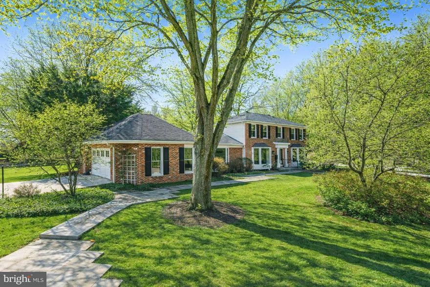 Discover 9632 Trailridge Terrace, a distinguished immaculate Colonial in Potomac’s sought-after Roberts Glen neighborhood, reimagined with a striking modern, gallery-inspired interior. Expanded and thoughtfully renovated over the years, this is truly a home that must be experienced in person. Offering 3,687 total square feet across three finished levels, it features 4 bedrooms, 3 full baths, and a powder room.
 Defined by light-filled spaces, contemporary finishes, and distinctive architectural details, the home’s most significant renovation introduced a sophisticated modern aesthetic throughout while substantially expanding the footprint. This transformation added a dramatic great room, custom windows that flood the interiors with natural light, cohesive design elements that unify the home with style and intention, an oversized 2-car garage, and a spacious mudroom. Additional highlights include hardwood floors - stained a neutral gray in 2024, Pella windows with pull-down screens, Hunter Douglas Silhouette shades, extensive recessed and accent lighting, an Ipe deck, an octagonal screened gazebo, a remodeled kitchen, an updated primary bath, custom closet organizers, and high-end hardware and finishes. HARDWOOD FLOORS BENEATH CARPETED AREAS.
 An extensive flagstone walkway, extending through the backyard, creates an elegant and inviting arrival. Inside, the great room addition is a true centerpiece, featuring vaulted ceilings, a gas fireplace, expansive windows, and French doors that open to the patio and backyard. This stunning space flows seamlessly into the formal dining room and kitchen. The gourmet eat-in kitchen is appointed with granite and Corian countertops, a Wolf gas cooktop, stainless steel appliances, white cabinetry, a pass-through window, three double-sided pass-through cabinets to the dining room, and a sunny breakfast area. Complementing the main level are a generously sized living room with a bay window and a private office with a gas fireplace, built-in shelving, and French doors opening to the Ipe deck. A powder room and sizable mudroom with built-in cabinetry, a closet, extra refrigerator and freezer, side door, and garage access complete the main level.
 Set on a private 0.37-acre corner lot, the backyard retreat is accessible from multiple points and creates a seamless connection between indoor and outdoor living. This tranquil setting is fully fenced, it features professional landscaping, mature trees, a tiered water feature, and gates on both sides of the property. Multiple outdoor living areas, including the flagstone patio, Ipe deck, and screened octagonal gazebo with a turret-style roof - offer exceptional spaces for relaxing or entertaining.
 The upper level includes four bedrooms and two full baths. The spacious primary suite offers two closets, including one walk-in. The upper level includes four bedrooms and two full baths. The spacious primary suite offers two closets, including one walk-in. The en-suite bath was beautifully updated in 2023 and features designer tile, a glass-enclosed shower, and a dual vanity. Three additional bedrooms and a hall bath with a jetted Whirlpool tub/shower complete this level. All bathrooms are appointed with high-end hardware.
 The finished lower level features resilient engineered hardwood floors, new carpet, recessed lighting, a laundry chute from the upper levels, and abundant closet space with automatic lighting. This level provides a full bath, a spacious family room, and a bonus room offering flexible space ideal for a playroom, fitness area, or additional recreation space. Bilco doors provide walk-up access, and a Samsung front-loading washer and dryer are also included.
 Ideally located with convenient access to major commuter routes, parks, recreation, and nationally rated golf courses, this exceptional home is further enhanced by top-rated Montgomery County schools.