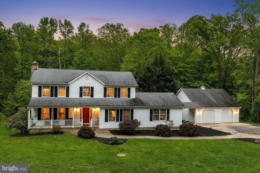 Discover this Colonial-style home set on a sprawling 10.71-acre wooded lot, offering a perfect blend of privacy and natural beauty. The property features a serene stream (Swan Creek) and wooded areas, ideal for outdoor enthusiasts and those seeking tranquility. With 2,592 sq. ft. of living space, this detached residence boasts 5 spacious bedrooms and 2.5 bathrooms, providing ample room for relaxation and entertainment. The full walkout basement offers potential for additional living space or recreational areas, while the detached two level garage accommodates up to 4 vehicles perfect for the car enthusiast, ensuring convenience and extra storage. Built in 1996, the home combines classic charm with modern functionality, making it a perfect canvas for your personal touch. Enjoy the peaceful surroundings and the opportunity to create your own outdoor oasis. This property is a rare find, combining expansive land with a well-designed home, making it an ideal choice for those seeking space and serenity. Great location with easy access to I-95.
