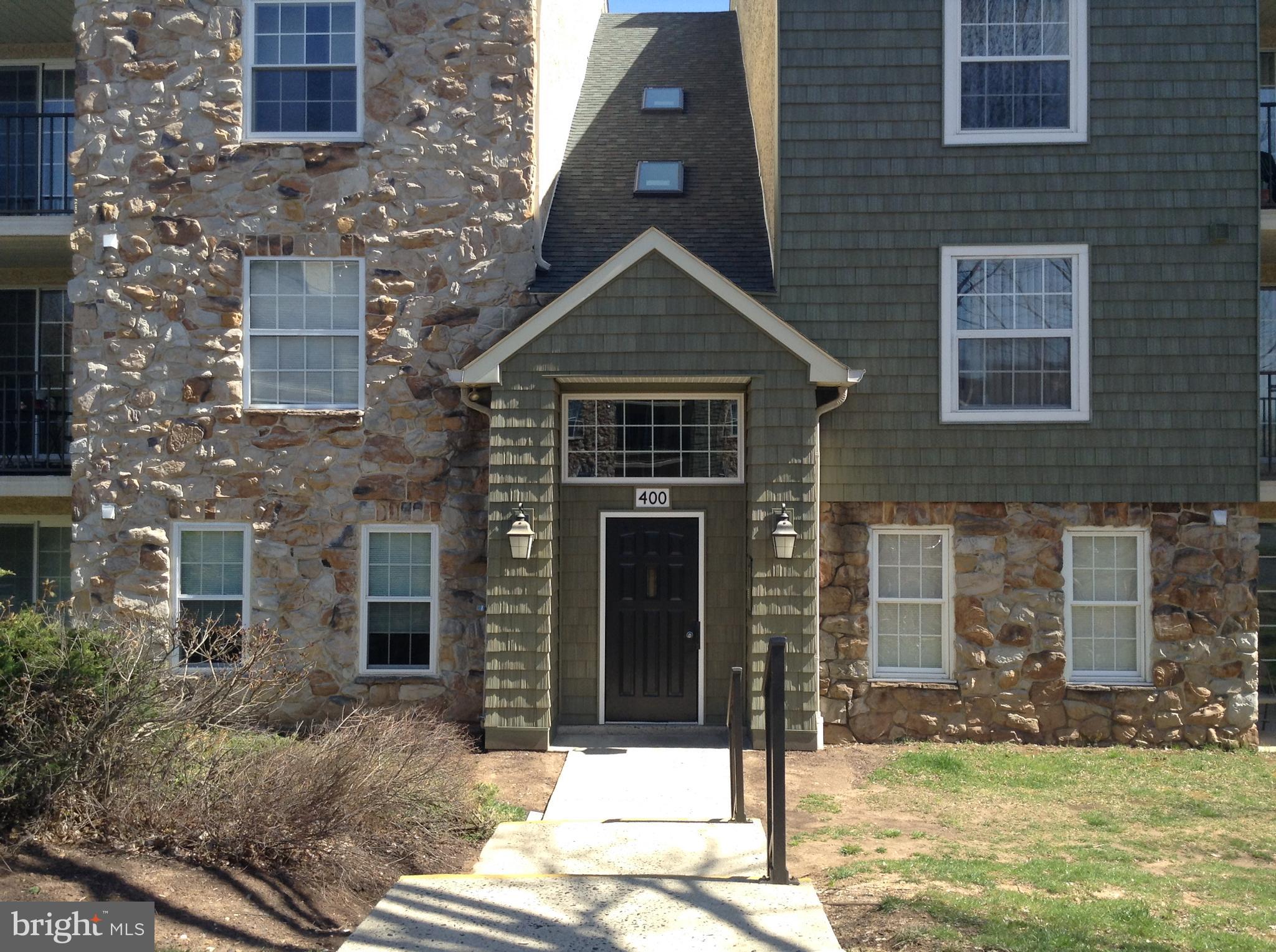Welcome to 406 Deer Run, a beautifully maintained 2-bedroom, 2-bathroom second-floor condominium located in the highly sought-after Deer Run community of East Norriton. This bright and spacious home offers 1,067 square feet of comfortable living space with an open-concept layout, vaulted ceilings, and a cozy wood-burning fireplace in the living room. The kitchen features modern appliances, ample cabinetry, and a breakfast bar that opens to the dining area—perfect for everyday living and entertaining. Step outside onto your private balcony and enjoy peaceful wooded views, ideal for morning coffee or unwinding after a long day. The smart split-bedroom design provides privacy, with each bedroom offering generous closet space and access to full bathrooms. The primary suite includes an en-suite bath and a large walk-in closet. Additional features include in-unit laundry, neutral finishes throughout, and a dedicated storage area. Residents of Deer Run enjoy access to fantastic community amenities, including a swimming pool, playground, and well-maintained common areas. With ample parking and easy access to major highways, shopping, dining, and local parks, this home is the perfect combination of comfort, convenience, and community. Whether you're a first-time buyer, downsizer, or investor, 406 Deer Run is a must-see!