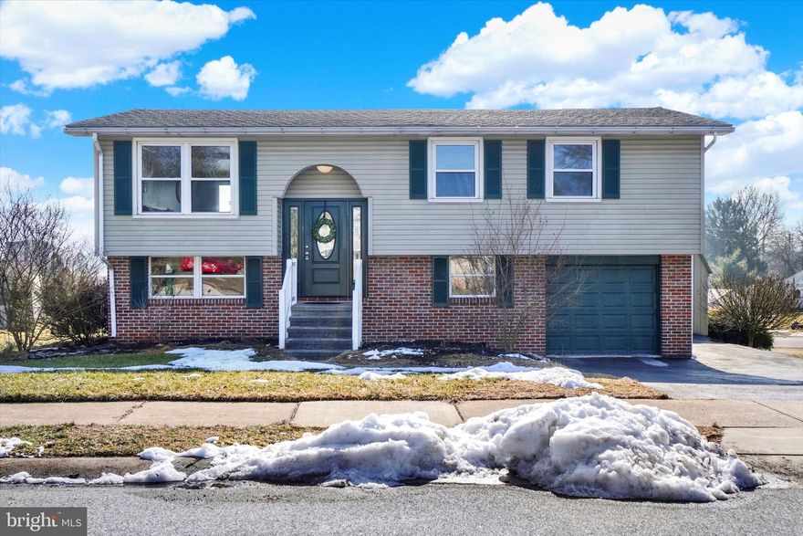 Welcome To This Wonderful Bi-Level Home Located In A Quiet, Quaint Neighborhood! This Lovely Home Features Brand New Carpet Throughout And A Spacious Open Floor Plan With A Bright Kitchen That Flows Seamlessly Into The Dining Area And Family Room—Perfect For Gatherings And Everyday Living!  The Lower Level Offers A Versatile Finished Room That Can Be Used As A Kid’s Playroom, Additional Bedroom, Home Office, Or A Second Family Room, Providing Endless Possibilities To Suit Your Needs!  Outside, You’ll Find An Impressive Large Detached Garage, Ideal For Your Hobbies, Workshop, Or Extra Storage Space. Additionally, There Is A Second Shed Shop At The Back Of The Property, Perfect For Tinkering, Crafts, Or A Workshop!  Step Out Back To The Beautiful Deck Overlooking The Serene Surroundings—An Ideal Spot For Entertaining, Relaxing, And Enjoying The Views. Don’t Miss Out On This Charming Home That Has So Much To Offer!