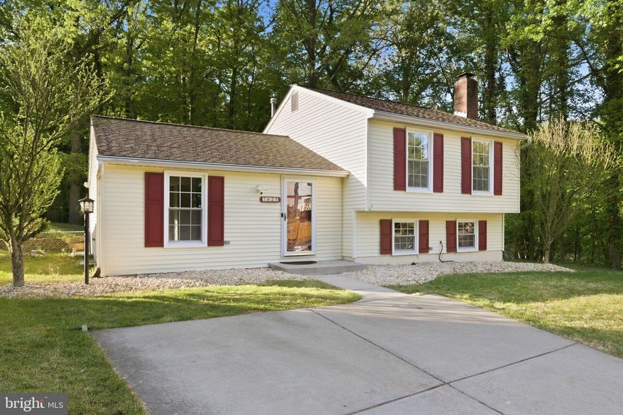 ***OPEN HOUSE: Saturday, 4/25 | 12:00 PM - 4:00 PM***
***OPEN HOUSE: Sunday, 4/26 | 12:00 PM - 4:00 PM***
BEAUTIFULLY UPDATED, SPACIOUS, PRIVATE SINGLE FAMILY HOME WITH SUNROOM AND PEACEFUL BACKYARD.  Open and bright main level welcomes you home, adorned with gleaming hardwood floor and freshly painted throughout. Living area flows seamlessly into the Dining space accented with decorative light and spacious modern Kitchen with all stainless steel appliances, new oversized sink (2026), new countertops (2026), overlooking the green private backyard.  Off the main area, step into peaceful and light-filled Sunroom with two skylights, plenty of floor-to-ceiling windows and sliding glass doors.  Deck off the sunroom with brand new boards (2026) and sitting bench with decorative arbor to enjoy your tranquil morning and relax in the evening. 
In the upper level, the home continues with durable Luxury Vinyl Plank flooring (2021) throughout. The spacious primary bedroom offers a peaceful retreat with a walk-in-closet, natural light, and multiple tall closet spaces. Updated bathroom (2026) includes new vanity sink, new floors, and new toilet. The second bedroom is equally spacious with multiple tall closets.
In the lower level, the fully finished basement (Remodeled in 2021) provides valuable additional living space, perfect for a recreation room, office, media area, or guest suite. Gas fireplace with ceiling-to-floor classic brick mantle.  A remodeled, second full bathroom (2021) in lower level adds both convenience and flexibility to the home.  Walk up from the basement rec room to the private backyard. 
What a private outdoor setting with sunroom, deck, private fenced yard, ideal for relaxing or entertaining! Backs to community association’s lands. Concrete durable private driveway right in front of the home. Backyard shed conveys. Major system updates include a BRAND NEW 30-year ROOF (2026), NEW HVAC system (2025), Microwave (2025), Washer & Dryer (2020), offering peace of mind for years to come.
Located in the established Summerhill Estates community, residents enjoy access to the Sheffield Recreation Association amenities, including a tot lot, walking paths, and basketball court. Conveniently situated near I-95, Route 1, and Fairfax County Parkway, with easy access to Lorton VRE, shopping, dining, and outdoor destinations such as Occoquan Regional Park, Pohick Bay Regional Park, and Mason Neck State Park. A MOVE-IN READY OPPORTUNITY IN A PRIME LORTON LOCATION—DON’T MISS IT!
Ask agent for List of Improvements and Neighborhood Profile. No HOA; Low recreation association fee of $262/year.