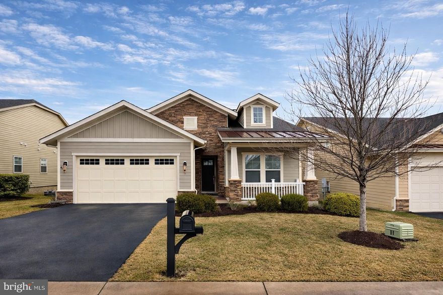 ***COMING SOON 3/16/26***
Beautifully maintained home located in the sought-after Shenandoah 55+ Active Adult gated community at Lake Frederick. Offering approximately 2,500 finished square feet, this home is designed for comfortable main-level living while still providing additional space for guests, hobbies, and storage.
The main level features a thoughtful and open layout beginning with 10-foot ceilings, engineered hardwood flooring, crown molding, and recessed lighting throughout. Just off the entry is a guest bedroom and full guest bathroom. A formal living room overlooks the family room, gourmet kitchen, and screened patio with outdoor fireplace, creating an inviting setting for both everyday living and entertaining.
The gourmet kitchen includes a large island and generous pantry, and opens to the a formal dining room and a family room with a cozy indoor fireplace, allowing the spaces to flow naturally together. Two upgraded sliding glass doors provide easy access to the outdoor living area, perfect for hosting family and friends or enjoying quiet evenings outside.
The primary suite is filled with natural sunlight and features a private bathroom with dual sinks, walk-in shower, and spacious walk-in closet. The main level also includes an exceptionally large laundry room and convenient access to the two-car garage (garage refrigerator conveys as-is).
The partially finished walk-out basement expands the living space with 9-foot ceilings and full insulation, and includes one finished bedroom and a full bathroom, making it ideal for visiting guests. The unfinished portion provides substantial storage or future finishing potential. Step outside to a stamped concrete patio that offers another relaxing outdoor space.
Major systems include HVAC (2016), Trane heating system (2016), Culligan water system (2016), all kitchen appliances (2016), and a hot water heater replaced in December 2023. The home also has an Eco Shield pest control contract, Verizon service availability, and parking for four vehicles total (two in the garage and two in the driveway), with additional street parking available on Rachel Carson Drive.

ABOUT THE COMMUNITY
Lake Frederick is an award-winning 55+ gated community centered around the scenic 117-acre Lake Frederick, located within a 900-acre master-planned neighborhood at the foothills of the Blue Ridge Mountains with convenient access to I-66, I-81, Route 50, Route 7, and Route 11.

Residents enjoy the Shenandoah Lodge and Athletic Club, featuring a modern fitness center, indoor lap pool, outdoor resort-style pool, movement studio, sauna, and spa locker rooms. Outdoor amenities include pickleball and tennis courts, dog parks, and more than 8 miles of lakeside walking and biking trails. The lake also offers fishing and non-gas boating.

The community gathering space, The Crow’s Nest, offers a variety of social and recreational areas including a golf simulator, sports lounge, billiards, card tables, art studio, library, and lakeside gathering spaces. Residents enjoy numerous clubs, events, and activities throughout the year.

Dining is available at Region’s 117, a popular farm-to-table restaurant located at Shenandoah Lodge featuring beautiful lake and mountain views from its covered outdoor veranda and firepit area.