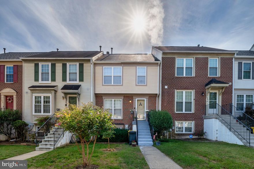 Warm and welcoming, this 3-level, 3 bedroom, 3 bath townhome is unbelievably priced and move-in ready!  The main level features a living room (with gleaming bamboo hardwoods),  a separate dining room (fed by natural light from the glass slider), a well-appointed kitchen (which boasts sleek wood cabinetry, newer stainless steel appliances, & a bump-out for your breakfast nook), as well as a convenient powder room...  Upstairs,  the spacious king sized master bedroom has double closets and a private entrance to the full bathroom where you will find dual vanities, a soaking tub, a separate shower, and newer LVP flooring.  Then two additional bedrooms allow options for sleeping or for an office to accommodate today's work-at-home professional... Finally, the walk-out basement is ideal for entertaining or for cozying up with a good book by the fireplace.  And an additional powder room and laundry /storage area complete this level...  Bonuses include: newer furnace & a/c, newer water heater & bathroom lighting, six-panel doors, recessed lights, a deck & patio, a fenced yard, and two assigned parking spaces!...  This centrally located home is 5 minutes to Ft Meade, NSA & Arundel Mills Mall with easy access to major commuter routes & BWI Airport!  Spring forward into home-ownership in 2026!