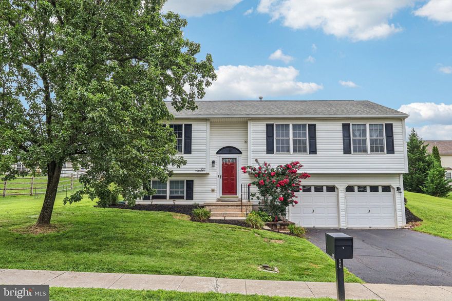 Welcome home to this beautifully updated single-family residence located in the heart of Amity Gardens. With new flooring throughout, this charming home offers a warm and welcoming atmosphere from the moment you enter. The main level features a spacious living room filled with natural light from a large front window. A standout electric fireplace with a mounted TV, mantle, hearth, and built-in bookshelves creates an eye-catching focal point and a cozy spot for relaxing or entertaining. The living room flows seamlessly into the dining area, where sliding glass doors lead out to a spacious back patio and yard with a large storage shed—perfect for outdoor dining, play, or gatherings. Adjacent to the dining area, the kitchen offers stainless steel appliances and a convenient coffee bar that provides both style and extra storage. Down the hall, you'll find three generously sized bedrooms that share a full hall bathroom, which also includes direct access from the primary bedroom for added privacy and convenience. The fully finished basement provides even more living space, featuring a large rec room with a second electric fireplace, a full bathroom, and a dedicated laundry room. This level also offers access to the attached two-car garage and driveway, making everyday living even more practical. Additional updates include a brand new HVAC system installed in July 2025, a new hot water heater in 2024, and motion-sensor exterior front lighting for added security and convenience. Located in a quiet, well-established neighborhood just off Route 422, this home offers easy access to King of Prussia, Philadelphia, shopping, and dining. With its thoughtful updates and ideal location, this lovely home is ready to welcome its next owner.