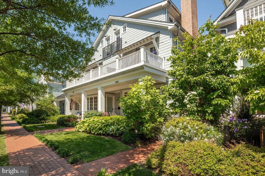 Embrace the ease of true coastal living in this beautifully appointed home, ideally situated just a short stroll from the waterfront and the bustling center of Downtown Annapolis. Blending classic seaside charm with refined finishes, this meticulously curated home features stunning interiors, where every detail reflects superior craftsmanship and thoughtful design. Rich hardwood flooring, custom moldings, and plantation shutters in the living room establish a sophisticated ambiance throughout. The formal living room, anchored by a gas fireplace, offers an inviting yet polished setting for both intimate evenings and gracious entertaining. At the heart of the home, the gourmet kitchen is impeccably appointed with professional-grade Thermador appliances, an expansive Silestone center island, and a custom-designed polished nickel pot rack by Ann Morris—a striking statement of artistry and function. Step out to the covered patio overlooking the thoughtfully designed gardens, creating a seamless transition between refined interiors and serene outdoor living. The primary suite is a sanctuary of comfort and privacy, featuring two substantial walk-in closets, a spa-inspired bath and a private balcony. A separate den on the primary suite level with its own balcony provides space for a study or a quiet reading room. The third level features two additional ensuite bedrooms both with vaulted ceilings, one offers a private balcony and the other a French balcony - both bathed in natural light and architectural character. Completing this exceptional offering is a detached two-car garage with unfinished storage above and the added exclusivity of private gated parking. The large unfinished lower level is perfect for extra storage! Perfectly positioned within walking distance to Downtown Annapolis’ acclaimed restaurants, boutiques, and cultural attractions, this home presents a rare opportunity to experience coastal living with grace, sophistication, and enduring style.