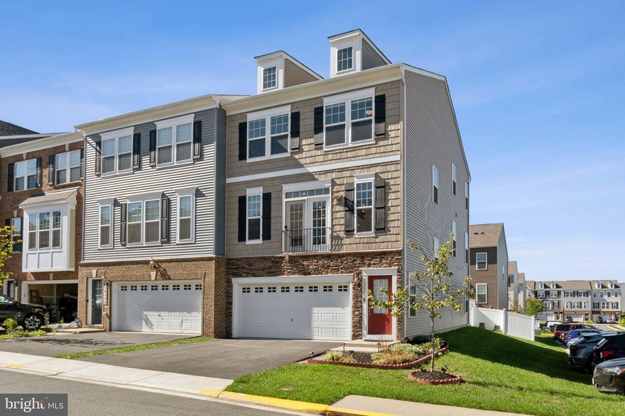 Welcome to this exquisite, like-new end unit townhouse located in the Bradley Square community! This stunning property offers an abundance of natural light, creating a bright and airy atmosphere that is sure to impress. The gourmet kitchen features sleek  cabinets, an oversized quartz island, and stainless steel appliances, making it the perfect space for entertaining family and friends. The luxury vinyl plank flooring adds an elegant touch, creating a seamless flow throughout the main level. This incredible townhouse also offers a 4th bedroom on the lower level with additional 3rd full bath, perfect for guests or a home office. The master suite boasts two walk-in closets, providing ample space for storage, and an en-suite bathroom with double sinks. Whether you're entertaining guests or enjoying a quiet night at home, this townhouse offers the perfect space to relax and unwind. An absolute must-see! Don't miss out on the opportunity to make this exquisite townhouse yours!
