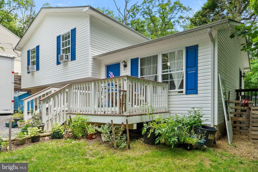 Welcome home to Gannentaha Trail! This home is cute as a button, very well cared for/maintained and complete with a number of upgrades completed within the last few years. Enter into the open kitchen/dining space, which is large enough to create your own little cooking oasis; just take note of the current dining room table to imagine all the possibilities of the space!  Heading to the upper level are two nicely sized bedrooms, one is an en suite primary with a sizeable bathroom and closet, the other flanks the second full bathroom.  The lower level, also off the entry,  hosts a large living room, perfect for casual or formal entertaining... whatever your preference!  Also on this level is a  laundry/storage/workshop area, just behind the closet doors.... Ready to move yet?  Wait until you see the yard!  Large, open and right off the big back deck, perfect just in time for BBQ season and whatever outdoor living you dream of! ***///*** Professional Photos and 3D Tour to come 6/5!