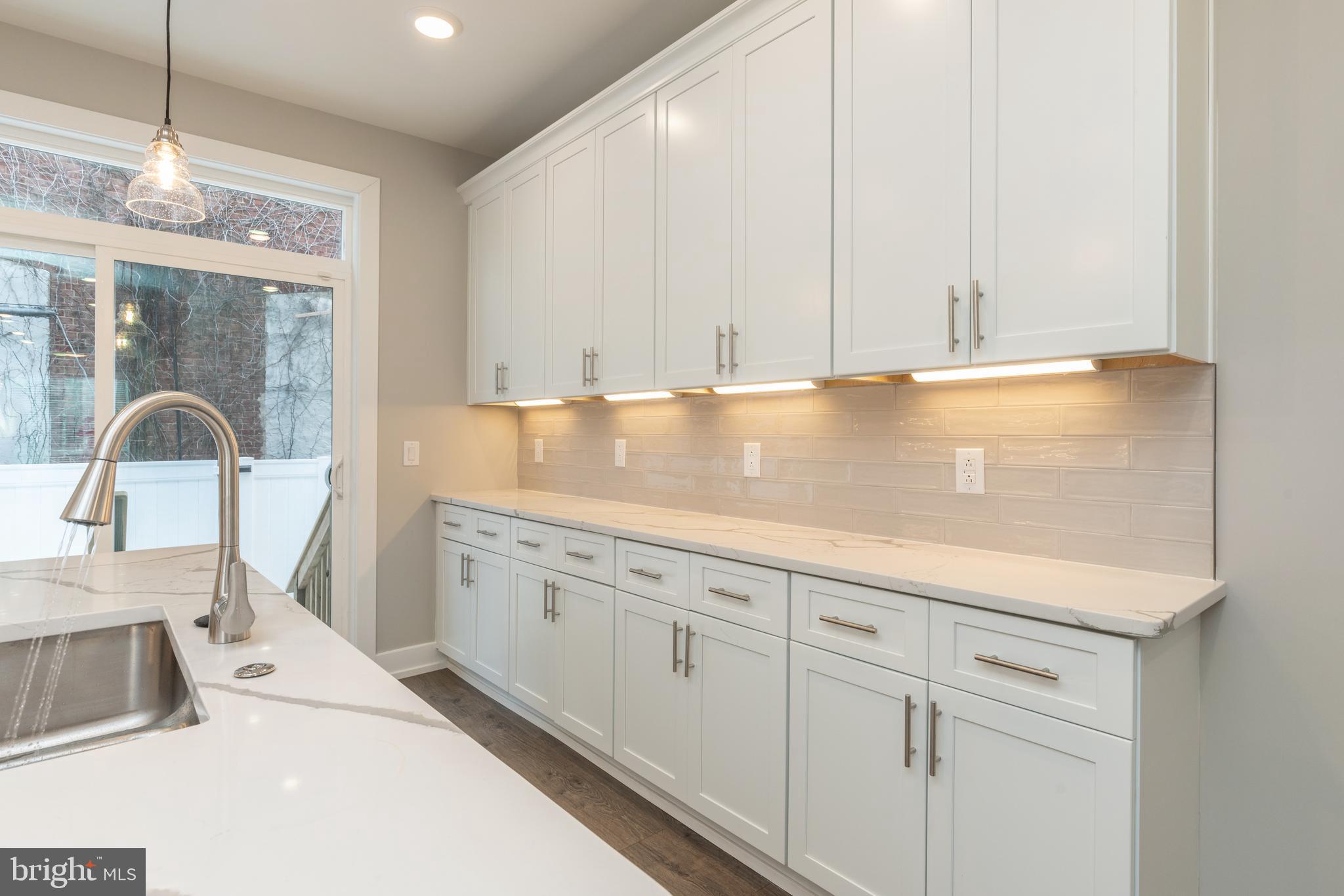 Welcome to 135 W Huntingdon St. These bi-level unit is located in one of the hottest growing areas of Philadelphia! This unit features 2 bed 1.5 bath bilevel unit with private backyard space. Unit includes in-unit washer/dryer, open concept living/kitchen, stainless steel appliances and quartz countertops. It comes with all the extras as well, from surround sound built in speaker system, to smart thermostat and security system. What a great block to live on with new construction all up and down the block. There are eight new construction duplexes right next to this one. Over 300+ new construction units either completed or currently under construction within a 3 block radius. Public transportation and the EL station is a few blocks walk and the Waterloo park is across the street and fully renovated . Call for more info.