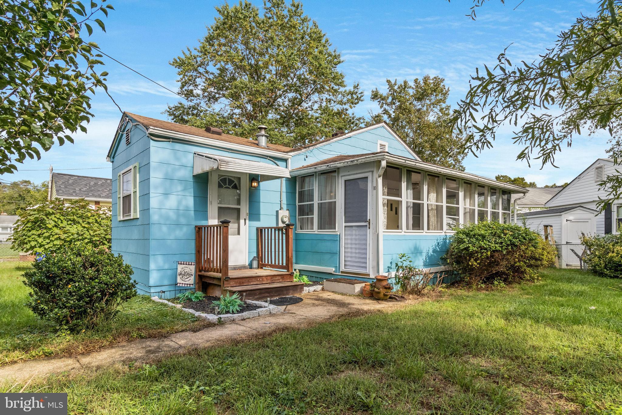 Cottage nestled in Indian Head is just a walk, stroll or roll away from the Potomac River. Freshly painted throughout with two bedrooms to offer new vinyl plank floors. One updated full bath with a spacious family room with new vinyl plank flooring. Enclosed and newly renovated front porch and newly remodeled neutral kitchen (2022) boasts white appliances, white cabinets and table space for eating. New furnace (2021). Nice size shed off the back side Community filled with amenities for your enjoyment. Nice size yard with landscaping and room for your pets. Contact the Housing office for most up to date fees and process. **NO INVESTORS IN THIS CO OP. OWNER OCCUPANTS ONLY.** LENDER MUST BE A COOPERATIVE MORTGAGE LENDER.