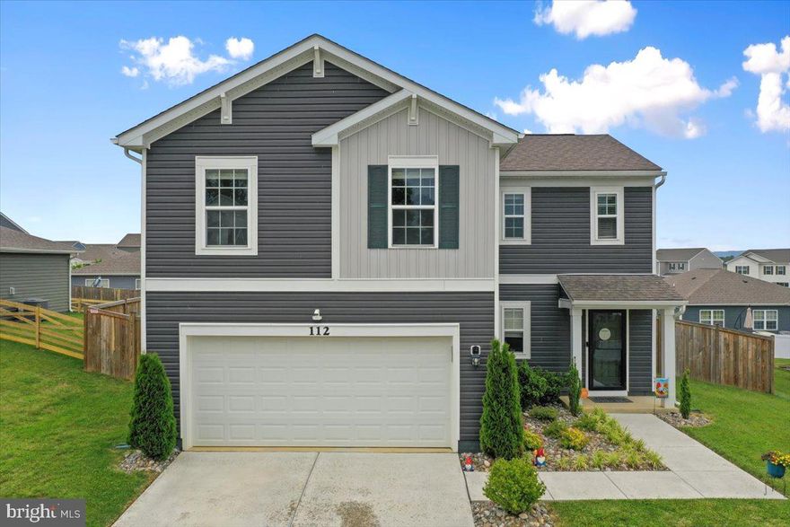 Why wait for a new build when this one is ready now and practically brand new?! 
Welcome to 112 Saber Drive, a beautifully maintained home in the highly desirable Magnolia Springs community of Charles Town. Built in 2021, this practically new construction offers the perfect blend of modern design, comfort, and convenience.

With 4 spacious bedrooms and 2.5 bathrooms, this home features an open floor plan that seamlessly connects the living, dining, and kitchen areas — ideal for entertaining or enjoying time with family. The kitchen boasts contemporary finishes, ample counter space, and a functional layout that’s perfect for everyday living.

Enjoy the added value of a concrete patio, and a fully fenced backyard—both upgrades completed after the home was purchased. Whether you're hosting a summer barbecue or enjoying quiet mornings with a cup of coffee, the outdoor space is a true bonus!

Located in a prime spot within Magnolia Springs, you’ll appreciate the peaceful neighborhood feel while still being just minutes from schools, shopping, dining, and commuter routes.

Don’t miss the opportunity to own this move-in-ready home in one of Charles Town’s most sought-after communities!