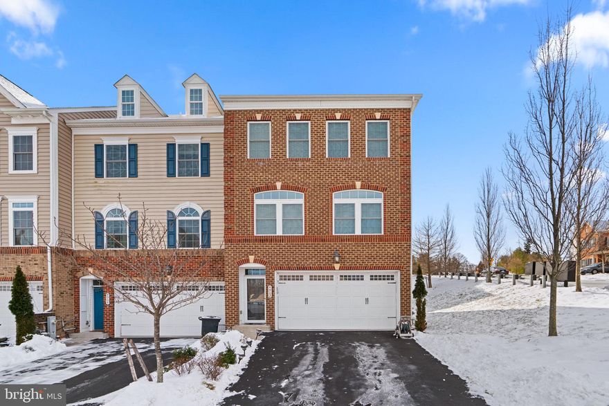 Beautifully maintained end-of-row colonial townhouse boasting 2,960 square feet, 3 bedrooms, 3 full baths, 1 half bath, and a 2-car garage in sought-after Autumn River. This home, cared for by its original owners, features a 10-foot extension on all three levels, enhancing both living space and functionality. 

The fully finished entry-level recreation room offers walk-out exterior access, two closets, a full bathroom, and convenient garage entry. Hardwood floors, chair railing, wainscoting, recessed lighting, and energy-efficient Hunter Douglas® shades elevate the open-concept main level, which includes a sunlit living room with a powder room, a formal dining area, and a cozy family room. The gourmet eat-in kitchen is a chef’s delight, complete with an island breakfast bar, stainless steel appliances, granite countertops, floor-to-ceiling cabinets, a warm mosaic tile backsplash, and elegant pendant lighting. Designed for entertainment, the home is prewired for a 5.1 surround sound system.

The upper level offers a well-appointed laundry room, 2 full bathrooms, and 3 generously sized carpeted bedrooms. The expansive owner’s suite is a serene retreat featuring two walk-in closets and a spa-like ensuite with dual sinks, an oversized shower with stunning floor-to-ceiling tilework, and a private water closet. Situated on a large corner lot, the home features a flat backyard for easy outdoor enjoyment, while beyond the retaining wall, additional space offers a gently elevated area for added versatility.

Residents enjoy easy access to Worthington Dog Park, Historic Downtown Ellicott City, Long Gate Shopping Center, and Meadowbrook Athletic Complex, along with HOA-provided amenities at the nearby Taylor Community Center and pool.