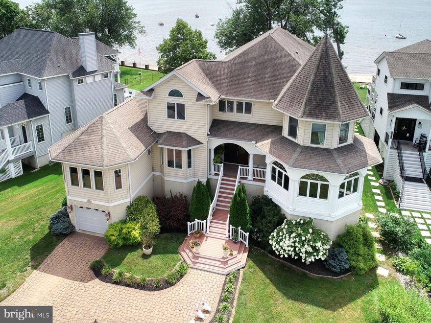 Welcome to this exquisitely designed and custom-built waterfront home nestled on the serene shores of the North East River in Charlestown, Maryland. With meticulous attention to detail, this home offers unparalleled luxury and breathtaking views. From the moment you step foot inside, you will be captivated by the seamless blend of modern sophistication and rustic charm. The open concept floor plan allows for seamless flow between the spacious living areas, perfect for both grand entertaining and intimate family gatherings. The expansive windows throughout the home showcase the stunning water views, creating a tranquil ambiance that invites relaxation and serenity. This exceptional waterfront home offers a unique opportunity to embrace a luxurious and idyllic Chesapeake Bay lifestyle. The outdoor living spaces have been thoughtfully designed to maximize enjoyment of the beautiful surroundings. Whether you choose to lounge on the spacious deck, take a dip in the river, or just relax on your private beach, the options for outdoor recreation are endless. Enjoy the sunsets over the river, unwind by the cozy fire pit, and savor the peacefulness and natural beauty that surrounds. Call for your personal tour today.