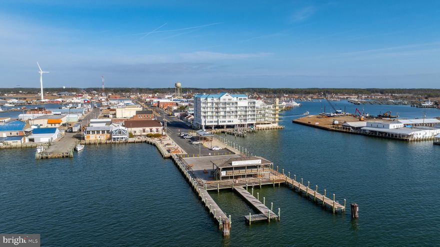 3 bedroom/ 3 Full Bath condo In Captains Galley Condominiums in Crisfield Maryland. Owners suite overlooks City Dock and the Tangier Sound. At almost 1900 sf, this condo offers an open concept and sizeable bedrooms. Home has been meticulously maintained with recent paint and flooring just completed! Captains Galley offers a roof-top pool and exercise room! Just a few feet from Somers Cove Marina for the boating enthusiast! Just a few hours from the DC and Baltimore Metro areas and 1 hour to Ocean City and other area attractions. Unit comes Partially Furnished!