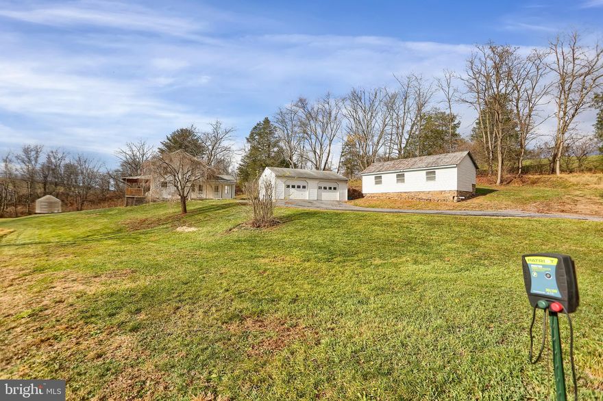 PRICED RIGHT.  A sweet farmette waiting for a new family.  Bring your kiddos and your animals and live off your own land.  6 acres with a 4 bedroom 2 full bath home.  2 car heated garage with large chicken house and shed/garage set up for animals.  Fence posts there to install as you see fit.  Small creek running thru lower end of property. Prepare for planting season now.  Call for all additional details.