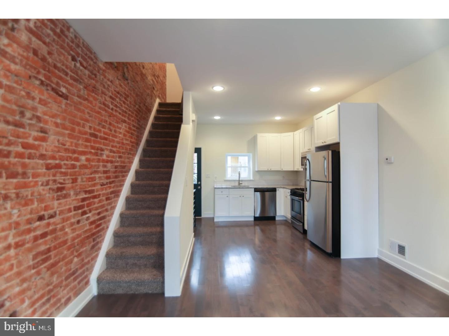 Full renovation originally built to be sold is now up for rent! No expenses spared. Brand new energy efficient windows & and fiberglass door with transom rounds out the clean brick exterior. Inside you are immediately greeted by an open floor plan with brand new hardwood floors, recessed lighting and a custom wrought iron bannister. The kitchen boasts a white subway tiled backsplash, a chef style faucet, white Shaker style cabinetry, stainless steel appliances & granite countertops. The back yard has a small patio and is an open canvas for your urban garden. The basement is large and fully finished which gives you and additional living area and a full bathroom In addition you can use the utility closet which has the washer and dryer can also be used as storage. Upstairs you have a large bedroom, walk in closet and bathroom. Bathroom finishes are top class. This home is close to all the best things in Brewerytown, Fairmount Park is basically your backyard, there is a grocery store only a few blocks away, great access to the highways means easy in & out of the city, the trolley easily connects you to Northern Liberties & Fishtown, while a quick busride takes you straight into the Art museum and into Center City. Brewerytown is literally booming with new construction & new businesses is popping up all over the place. Take advantage of an early start before rent prices increase and lockup a 2 year lease with no rent increase before it is too late!!