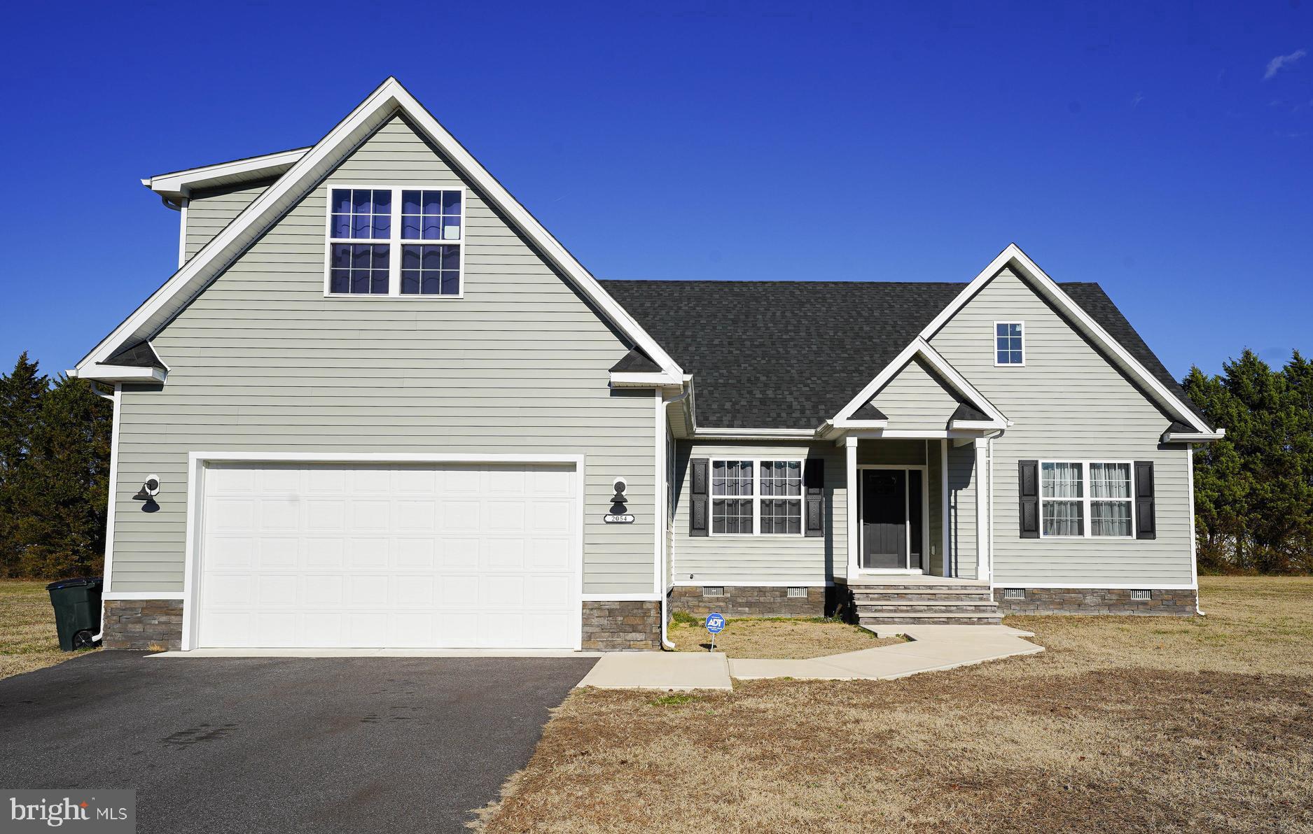 Immaculate 4BR/2BA home - Custom built by local builders in 2023 in sought-after Jenkin's Orchard community. Large .7 acre lot backing to trees. Welcoming exterior features a handsome stone foundation on 3 sides, covered porch. Wide open concept floor plan, 9' ceilings, with a large dining area and family room. Dream kitchen - wood cabinets with moulding, upgraded granite countertops, oversized island, stainless-steel appliance package, pantry. Spacious primary bedroom boasts 2 walk-in closets, full, en-suite bath -- custom tile shower w/bench and tile niche, extended double-sink vanity with granite counters. 2 additional first floor bedrooms. A 2nd full bath with granite counters and a tub/shower combo, LVP flooring. Laundry room w/ storage area leads into the oversize 2-car garage. 2nd floor houses the 4th bedroom / flex space.Incredible location - across the street from Newtown Park and Recreation area - 2mi to Historic Downtown Pocomoke - a charming small town with rich history, art scene, boutique shops - even its own movie theatre - public parks and boat docks, & unique restaurants on the banks of the Pocomoke River. Location qualifies for 100% Financing! 19mi to NASA Wallops Facility, 19mi to beloved Chincoteague Island, and the incredible wild horses and sandy Atlantic beaches of Assateague. Close to everything Worcester County has to offer - boating, world-class fishing, crabbing, wildlife estuaries, incredible state parks - a true paradise for nature lovers, photographers, boaters - anyone who wants to enjoy the more relaxed pace of the Eastern Shore. Just 2-3 hours to major metro areas - Virginia Beach/Norfolk, Washington DC, Baltimore, Philadelphia, NYC. Life in Worcester County is good - from the beaches to the bays & beyond! Sizes, taxes are approximate.