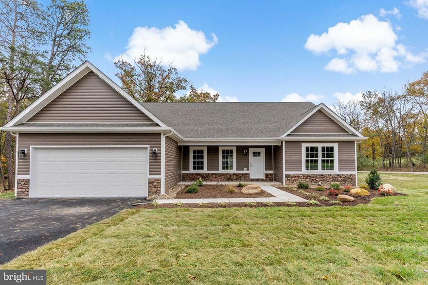 Welcome to Cacapon South- this inviting 3-bedroom, 2-bathroom rancher located in a serene and well-maintained neighborhood with blacktop roads could be yours. This home seamlessly combines classic charm with modern upgrades for a comfortable living experience. Interior highlights- to name a few upgrades through out the home; wainscotting, shiplap, granite countertops,  recess lighting, stainless steel appliance package, & so much more.  One of the standout features of this property is the expansive unfinished basement. This versatile space offers endless possibilities, whether you envision a rec room, home gym, additional bedrooms, or simply ample storage. With its generous size and potential, the basement provides the flexibility to tailor the home to your specific wants & needs. The exterior of the home is equally impressive, showcasing a refined combination of stone and upgraded vinyl siding, which delivers a modern look. Schedule your private tour today. Right across the street from Cacapon State park where you can enjoy fishing, hiking trails, swimming, golf course, hunting, & more.