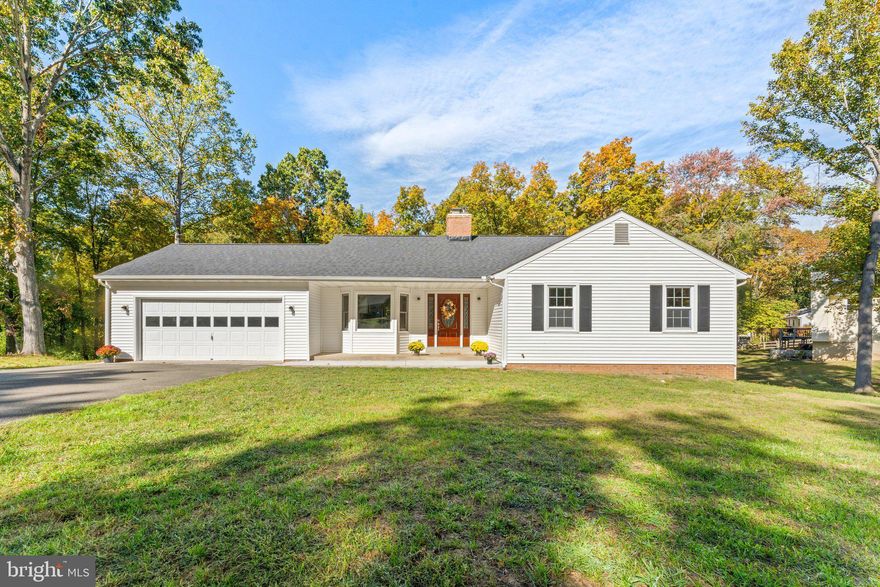 *HGTV Worthy!!!* Beautiful Completely Remodeled Rambler w/ Front Porch and Fully Finished Basement on the DC side of Warrenton. The home is situated on a Gorgeous 1.08 Acre Lot that backs to beautiful mature hardwood trees. The main level offers an open floor plan, separate dining room and a kitchen with All New - white shaker cabinets, upgraded countertops & stainless steel appliances. The breakfast room has a bay window that would be perfect for banquette seating. There is a brick fireplace w/ log insert in the living room and a sliding door that leads to the deck. The master suite features a private bath and his and hers closets. All 3 baths are renovated. Recessed lights and oversized molding throughout. All New Updates Also Include: Laminate Wood Plank Flooring & Carpet, Lighting-inside & out, Doors, Tilt-In Windows, Painting, Hot Water Heater, etc. The lower level offers a spacious family room, full bath, game room, utility/laundry room w/ linen tub, walkout sliding door and plenty of windows for lots of natural light. There is also a flue for a wood-burning stove. The completely finished 2-car garage is sure to delight. Newer Roof, HVAC & Hot Water Heater. Public utilities. Commuter lot is one mile away. Survey just completed and in documents section of listing.