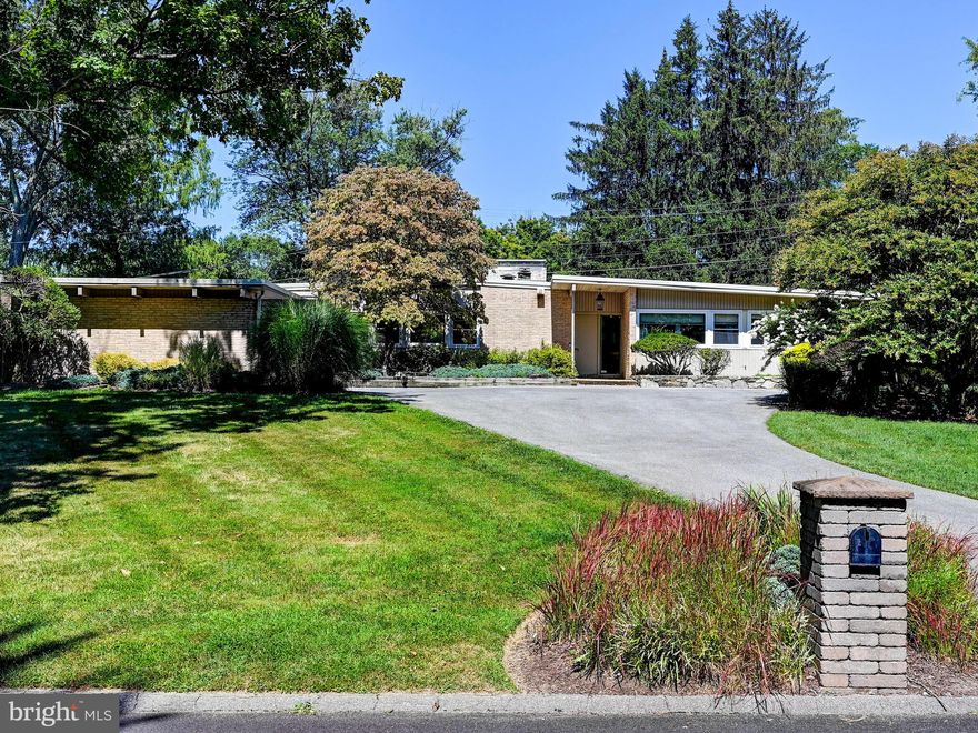 ALL OFFERS TO BE SUBMITTED BY THURSDAY, SEPT 7TH AT 5:00PM. WOW! DON'T MISS THIS FABULOUS SPRAWLING CONTEMPORARY BRICK RANCHER WITH 2 CAR GARAGE ON GORGEOUS LANDSCAPED LOT. THE SUN DRENCHED LIVING ROOM & DINING ROOM WITH HIGH BEAMED CEILING, HARDWOOD FLOORS & STONE FIREPLACE.  AND THE WALLS OF GLASS PROVIDE GORGEOUS VIEWS OF THE AMAZING REAR YARD,  THE UPDATED STAINLESS & GRANITE KITCHEN IS WONDERFUL WITH ISLAND, GAS COOKTOP, DOUBLE OVENS & BREAKFAST AREA!  FABULOUS SPARKLING HEATED IN-GROUND SALTWATER POOL, POND, FIRE PIT  & HOT TUB ARE ALL LOCATED ON THE REAR PAVER PATIO! AND THE LARGE OUTDOOR GRANITE KITCHEN WITH MINI FRIG, GRILL, PIZZA OVEN & BREAKFAST BAR IS AWESOME!  FABULOUS OPEN FLOOR PLAN WITH MANY UPGRADES THROUGHOUT & AN ADDITION OFF PRIMARY BEDROOM INCLUDES AN EXERCISE RM & 2ND PRIMARY BATH W/STEAM SHOWER & WHIRLPOOL TUB!  PRIMARY BEDROOM ALSO  BOASTS 3 WALK-IN CLOSETS & ACCESS TO POOL AREA. . THE HALL BATH IS  UPDATED TOO! THE 4TH BEDROOM IS CURRENTLY USED AS AN OFFICE.  ENJOY THIS MAGNIFICENT PRIVATE SERENE REAR YARD WITH PATIO & OUTDOOR ENTERTAINMENT AREA. GENERATOR INCLUDED. THIS HOUSE IS EXCEPTIONAL! YOU WON'T WANT TO MISS THIS ONE!