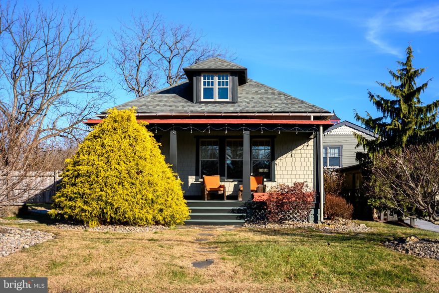 What a delightful Craftsman-style home! Completely updated, 623 Sugars Bridge Rd offers a must-see kitchen and bathrooms with high-end details throughout, including a claw foot tub, glass front kitchen cabinets, and gourmet appliances. This bright and light-filled floorplan offers a spacious, open-concept living and dining room as well as 2 bedrooms and 2 full bathrooms all on the main floor. A mudroom leads out to the fenced backyard, and there’s an unfinished basement for plenty of storage. There's also a wonderful loft that offers distinctive touches of its own with an A-frame ceiling and 2 dormer windows with natural wood trim which would make enticing spots to unplug and unwind. Inside and out, this home pays homage to natural wood elements and chic design. There are open tread stairs, live edge countertops, and a natural wood pedestal sink mount, just to name a few. Outside, in true Craftsman style, this home boasts a covered front porch and Hardie Board exterior siding for a longer lasting “wood look,” all finished in natural hues. You’ll also enjoy a fenced backyard with a brick walkway and patio, a covered back porch, and there’s a 4-car dedicated parking area. What an amazing find in a central location, with convenient access to Kennett Square, Downingtown, and West Chester. Located in the Historic Village of Marshallton, you’ll enjoy close proximity to the popular Four Dogs Tavern and the Marshallton Inn. 623 Sugars Bridge Rd is one of those rare gems that deserves a personal visit. Request a tour today!