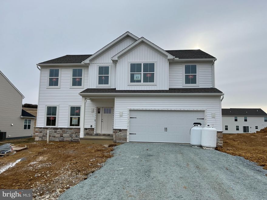 Enjoy $7,500 in Flex Cash on select standing inventory closing on or before March 31, 2026—use it in the way that best supports your purchase. Buyer qualifications apply. See Agent for details.

Welcome to the impressive Blue Ridge Floorplan—where space, style, and comfort come together to create the perfect place to call home. This beautifully designed 4-bedroom, 2.5-bath layout with an upstairs loft offers an open-concept flow that makes everyday living and entertaining effortless. The family room, breakfast area, and upgraded kitchen connect seamlessly, enhanced by recessed lighting, added family room windows, upgraded cabinets and hardware, quartz countertops, tile backsplash, gas stainless steel appliances, and a spacious island. A morning room expands your main-level living even further, while the first-floor flex room gives you the freedom to create a home office, playroom, or hobby space.

Upstairs, find 4 generously sized bedrooms plus a versatile loft—perfect for a second living area or hangout space. The Serenity Primary Bath upgrade elevates your suite with a raised-height double vanity, slipper-style soaking tub, 4' shower, recessed lighting with dimmer, and an additional 50-gallon water heater. Second-floor laundry adds everyday convenience, and upgraded flooring, lighting, door hardware, and two-tone paint bring a polished finish throughout.

Outside, enjoy the 14x10 composite deck with steps to grade—ideal for outdoor dining or relaxing. The full unfinished basement with a 2-piece rough-in provides endless potential for future custom living space. Additional features include 9' first-floor ceilings, a mudroom bench with window, media chase, Manabloc plumbing system, smart deadbolt, and garage door opener with keypad. Stone and vinyl exterior adds beautiful curb appeal. Plus, enjoy peace of mind with our 10-Year Warranty.

This upgraded Blue Ridge has the style, space, and modern comforts today’s buyers are looking for. Don’t miss your chance to make it yours! 💙🏡

The photos in this listing are of the same model as the home for sale but may show upgrades and features not included in the actual property.

The new assessment for this sub-division has yet to be completed; taxes shown in MLS are zero. A new assessment of the improved lot and dwelling will determine the taxes due.