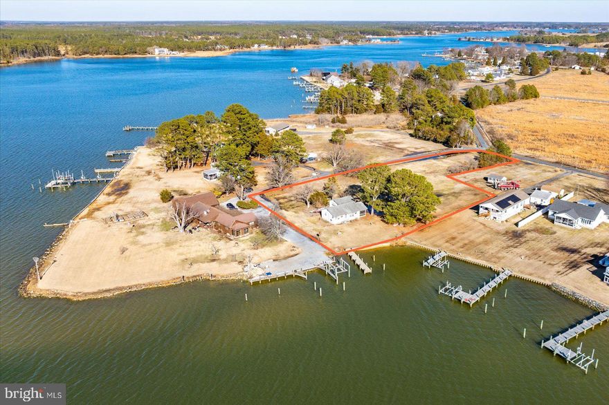 WATERFRONT Opportunity! This is a great vacation home and has a lot of potential. Whether you want to crab or fish off your own pier or hop on your boat and cruise out to the Little Choptank, your excursions are endless. This large lot is 2.52 Acres NW of Deep Point Road.  You must see this adorable 816 sq ft cottage - two-bedroom and one full bath. The interior offers a surprisingly open flow floor plan with beautiful hardwood floors.  The screened porch offers a shady spot perfect for your crab feasts and watching all of the wildlife and shore birds. Sip your morning coffee in the sun-drenched kitchen and watch the geese and ducks swim by. Fish and crab from your own pier - 3 ft MLW estimated and has a shoreline retaining wall. Previous owner had a small sailboat in the slip for years.  This cottage sits perfectly for sunshine views all day.  The large, detached garage has a workbench and plenty of storage for all of your toys. Close to the Woolford Store, the Harriet Tubman Museum, the National Blackwater Refuge, and Lindy’s Seafood.  Municipal sewer.  You must see this one to fully appreciate it - schedule a showing today!