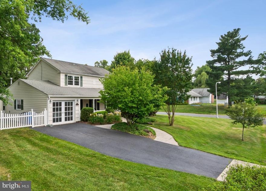 This stunning colonial is located in the sought-after Buckingham neighborhood of Bowie, MD. You'll find pride of ownership throughout this home, starting with the oversized covered front porch, perfect for relaxing and enjoying year-round. This well-maintained home boasts four bedrooms, three and a half baths, and over 2,500 square feet of living space. It sits on a spacious corner lot secured by a vinyl fence. Featuring two owner's suites (upper and lower), a NEW fully renovated kitchen with new cabinetry, flooring, and stainless steel appliances, this home offers exceptional value. The NEW lower level has hard flooring throughout, and the wood stairs have been newly refinished. The main level owner's suite boasts palladium windows, a large custom walk-in closet, and a full bath with a shower. This space also offers full ADA accessible features. The upper level owner's suite includes two additional walk-in closets, attic space, and extensive brand new kitchen cabinetry for ample storage. Crown molding, custom window treatments, and fresh paint make this home charming and move-in ready. The well-maintained exterior features professional landscaping, paved walkways, a rear patio, a newly sealed driveway, a custom garage door, and a large storage shed. For added peace of mind, the home has a fully serviced furnace/AC system, a water heater, NEW WINDOWS, a newer roof, and a standby generator. This commuter's dream offers easy access to Route 50 (17 minutes to DC line), BW Pkwy, and Rt. 3/301.  Multiple well-maintained parks, recreation areas, Allen's Pond, shopping, restaurants, top-rated schools and universities, and public transportation options including MARC/Amtrak train are all nearby.  Open house Sat. 6/15 12-3PM.