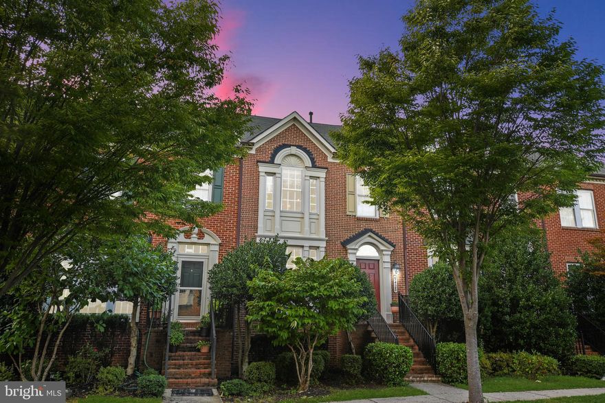 Wow! This lovely Villages of Urbana townhome is a model that is hard to find! 9428 Dunraven Street is a fantastic highly-coveted four-level NV--freshly painted in neutral shades and with new carpet--and is move-in ready. A short walk from the Villages of Urbana resort-style pool and work-out room and close to highly ranked schools and Urbana amenities, this home has it all. The main level features gleaming hardwood floors, plenty of light, and a spacious living area with a cozy two-sided fireplace! A great entertaining space--the living area flows into the gourmet chef’s kitchen--with granite, stainless steel appliances and a light-filled eating area. Walk out to the expansive deck--a great space for enjoying that morning cup of coffee! On the first upper level, you’ll find a spacious Primary Suite with a sitting area, two walk-in closets and a spa-like ensuite bath. Plus, two more spacious bedrooms and a convenient hall bath. The entire top upper level features an extra-large bonus bedroom--perfect for a  guest suite--with an extra-large walk-in closet! On the lower level--the possibilities are endless! The extra large recreation area walks out to the flat, fenced backyard. Plus, you’ll find a full bath, convenient laundry area with a utility sink and a bonus room--great for a guest room or office. With 4 bedrooms, 3 and a half baths and plenty of bonus areas, this home provides plenty of great spaces for living!