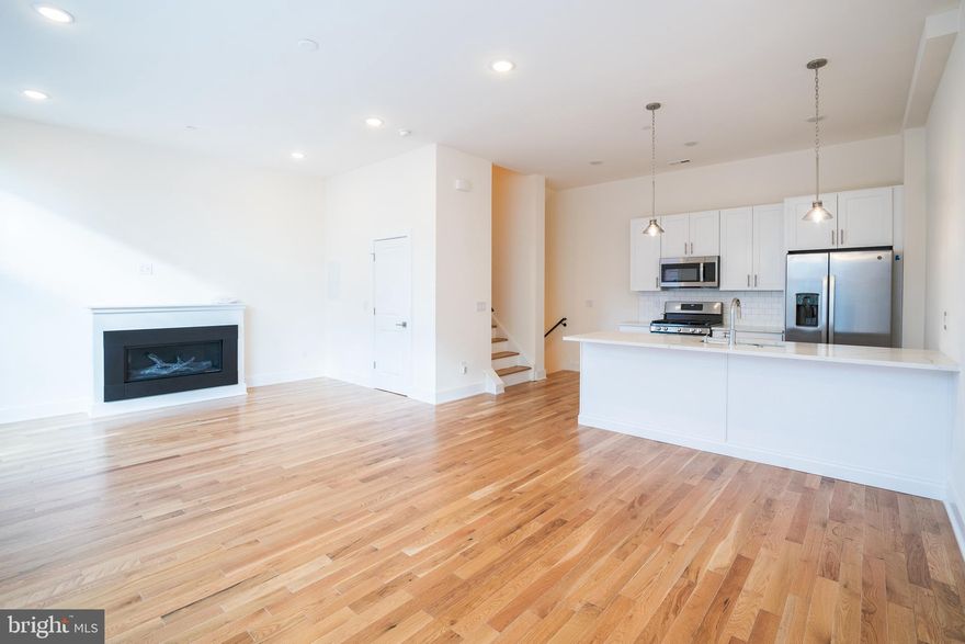 Be the first to live in a massive luxury 3 bedroom, 2 bathroom property situated in the heart of Northern Liberties that is just footsteps away from bustling North Second Street. Upon entering the unit, you will head upstairs to find an incredibly spacious kitchen and living area that has floor to ceiling windows (with window treatments) letting in tons of natural light, access to a private balcony, and a gorgeous fireplace. The modern kitchen boasts overhead designer lighting, subway tile backsplash, a breakfast bar counter, and a full suite of new stainless steel appliances. Up on the second floor, there are two nicely sized bedrooms as well as a laundry closet and a convenient hall bathroom that comes with a shower/tub combination. The third level boasts the master suite that is sure to impress. The huge master bedroom has access to a second private balcony as well as a gorgeous en-suite bathroom that comes fit with a soaking tub, marbled shower, and double sink vanity. It gets even better, as this connects to a large walk-in closet that has built-in shelving for added organization. Finally, be sure to relax on the private roof deck where you can take in beautiful views of the Center City skyline. Additional amenities of this residence include a large coat closet on the first floor, central air conditioning, smart home technology such as a nest thermostat and ring doorbell, and access to garage parking that will be available in June. The combination of expansive living space, luxury features and direct access to one of Philly’s hottest neighborhoods makes this property a true gem – secure it now before it goes off the market! 

*2 dogs max permitted with $350 non-refundable pet deposit and $50/mo pet fee. Sorry, no cats.
*Garage parking space available in June for additional $175/mo.
