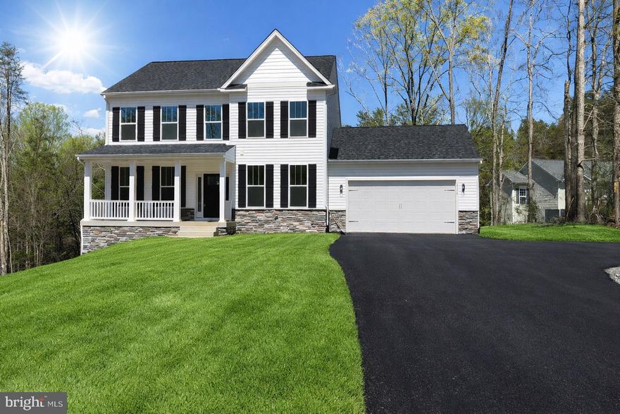 BRAND NEW CONSTRUCTION - LAKE ANNA - WATER ACCESS  - WYNDEMERE - XFINITY HIGH SPEED INTERNET -  AVAILABLE  NOW - Just in time for lake season at a fantastic price! The 4-bedroom Haven, crafted by award-winning builder Foundation Homes, blends timeless colonial style with modern craftsman touches. Step inside from the welcoming front porch into a bright foyer, flanked by a private flex room with double doors and a spacious dining room that flows seamlessly into the gourmet kitchen. Outfitted with high-quality white shaker soft-close cabinets, stainless steel appliances, quartz countertops, a large stainless   sink, and an expansive island, the kitchen is both stylish and functional, perfect for cooking and gathering. Oversized windows fill the kitchen, eating area, family room, and sunroom with abundant natural light.  The main level showcases 9-foot smooth ceilings and durable, waterproof luxury vinyl tile, ideal for active households. Beautiful oak-tread hardwood stairs lead to the second floor, where all four bedrooms and a convenient laundry room await (1 bedroom NTC- septic). The owner’s suite features two walk-in closets, a linen closet, and a stunning en suite with double vanities, a soaking tub, and a tile shower. The additional bedrooms offer generous closet space.   The unfinished walkout basement provides excellent storage and future expansion potential. An oversized composite back deck overlooks your backyard, offering the peaceful setting everyone desires.  This beautiful home is located in Wyndemere, an inviting Lake Anna community offering fantastic amenities, including basketball and tennis courts, a picnic area, a community boat launch, and boat slips available for an annual lease, all on the public side of Lake Anna.   Make this home yours today! Photos are similar to the home, but not exact.  Please see Selections in Docs for exact choices.