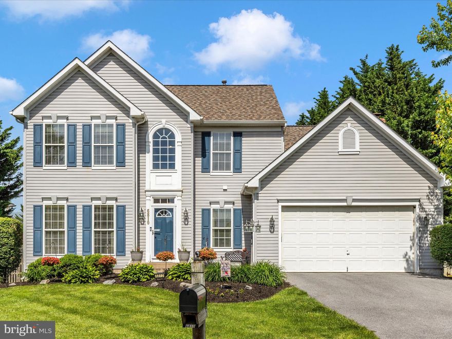 The original owners have lovingly maintained and enhanced their home over the years. Your first impression will be the 2-story foyer with solid hardwood floors and where the 2nd floor balcony railing opens to the 2nd floor. A quaint powder room is privately located off the foyer. The main level has 9' ceilings with an open floorplan and crown molding in the living room, dining room and foyer. An angled staircase is positioned between the formal living and dining rooms. The kitchen has oak framed cabinets with 2" crown molding on the wall cabinets, granite countertops with tile backsplash and ceramic tile flooring.  A spacious sunken family room with wide plank oak flooring and a wood burning fireplace is so welcoming. The 4 double-hung windows with large transoms above, makes this space light and bright. The first-floor laundry room off the garage also serves as a mudroom. Upstairs you will find 4 bedrooms and 2 full bathrooms. The owner's bedroom is huge with a large walk-in closet. The owner's bathroom has been updated with luxury vinyl plank flooring, custom tilework on the tub platform & shower surround with a custom glass wall and glass shower door, plus a double bowl vanity with a quartz countertop. The hall bathroom is centrally located and also includes a quartz countertop with double-bowl vanity. The main staircase features a switch-back staircase with a large circle-top window above a twin double-hung window. The lower level is unfinished but includes a rough-in for another bathroom and plenty of space to update as you desire. The rear yard is exceptional with a huge composite deck including an attractive and practical deck canopy. The fenced-in rear yard has plenty of open space. Overall, this home is ready to move in and awaiting the next family to enjoy many years of enjoyment as did the present owners.