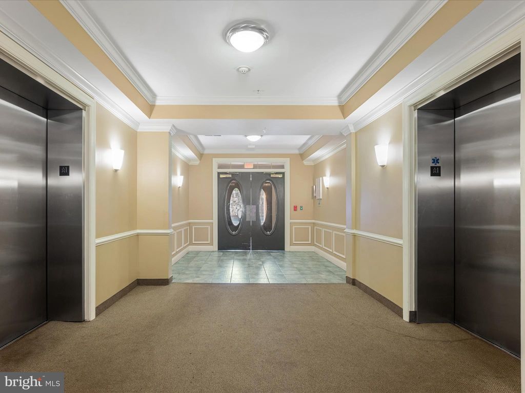 Photo of 9700 Elzey Place #UNIT 302, MANASSAS PARK, VA 20111 (MLS # VAMP2003380)