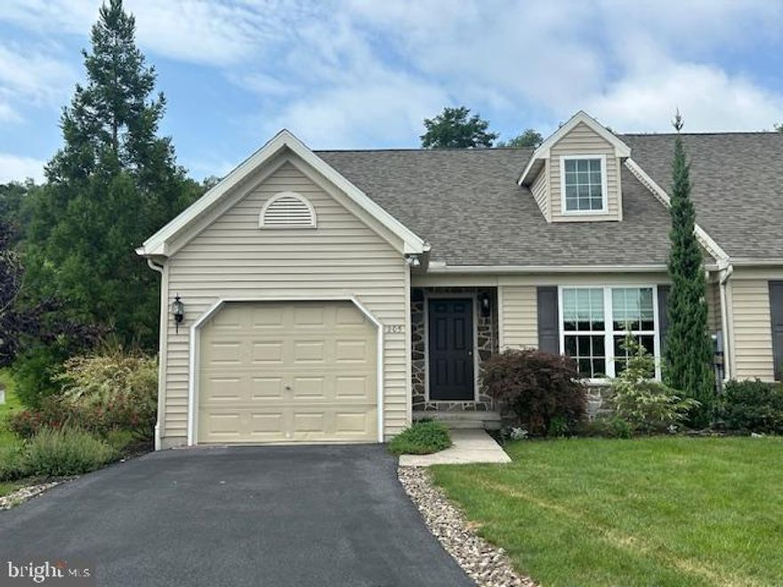 Enjoy the amenities of living in a planned community with this 2000+ sq ft duplex in Blossom Hill. The home features 2 bedrooms, including a first floor primary bedroom with en suite bathroom; an open floor plan eat-in kitchen- family room and sunroom; a separate dining room and an enclosed porch. The upstairs features a bedroom, full bath and loft that would be great as a home office or a hobby space. On the main floor the dining room and family room areas feature hardwood floors and a gas fireplace with the family room boasting a vaulted ceiling with recessed lighting. The kitchen includes an eat-in area and a small island, bump out bay, recessed lighting, tons of cabinet space and a pantry, with the first floor laundry nearby.  The enclosed porch has custom window treatments and opens out to the fenced -in backyard with a separate shed for garden tools. The privacy of this .29 acre lot is unsurpassed in Blossom Hill with woods and field to the rear and side- no houses will be built behind this home. The full basement is untouched space that could be finished to additional living area and includes an egress window as required by code. The house was built in 2009 and has just had the roof replaced in June 2025.  Other mechanical features include a natural gas, forced air furnace, central AC, a passive radon system, maniblock plumbing system, poured foundation walls, energy efficient windows and much more. The HOA fee includes some lawn care and trash removal. Consider making your life easier with a move-in ready home at Blossom Hill! Call for a personal tour before it's too late!