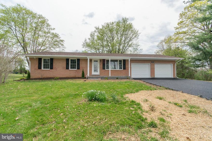 Over 2 acres of unrestricted land. GREAT FOR ANTIQUE - CAR HOBBYISTS!! This beautiful 4 bedroom 2.5 bath home has an additional 36x40 garage that can house multiple cars, boats, a large camper(s) or would make a great workshop. Features include granite counters, wood & ceramic tile flooring, patio deck & oversized ceramic shower in master bath. All brand new upgrades! Garden, livestock, chickens!!