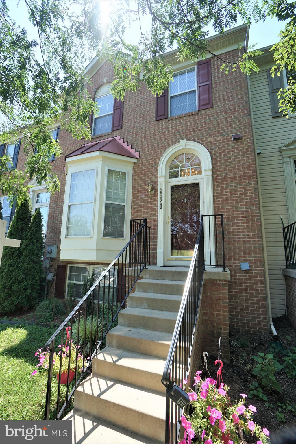 Spacious 3 level Brick front townhome in Ballenger Crossing.4BR 3.5 bath. Open main level perfect for entertaining guests w/ hardwood throughout. SS appliances and kitchen island, breakfast room. FR off kitchen w/gas FP. Separate LR. Upper level features Master Suite w/ attached bath. LL has open rec area, storage, and full bath/bedroom. Large wood deck off rear backing trees and a walking path.