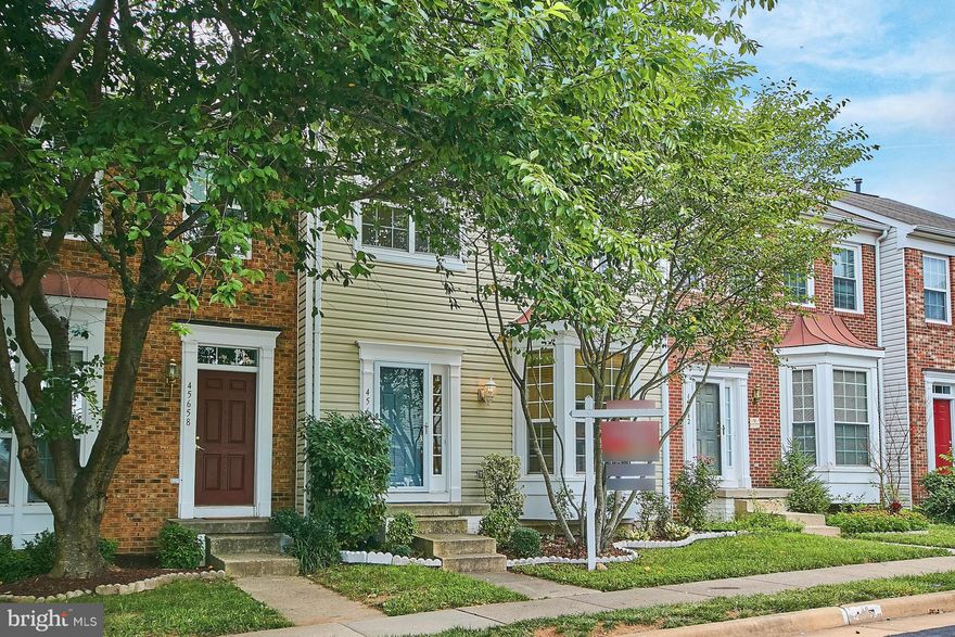 Charming, well maintained & recently updated, this spacious townhouse is ready for you! Main level hardwoods throughout, sun filled kitchen w/ ceramic tile, SS appliances, and new granite. New carpet upstairs & down, new bath fixtures, new lighting, double vanity in MBA, 3 full baths in all. Large deck backs to woods. Finished basement w/den, fireplace & full bathroom. Two reserved parking spaces.