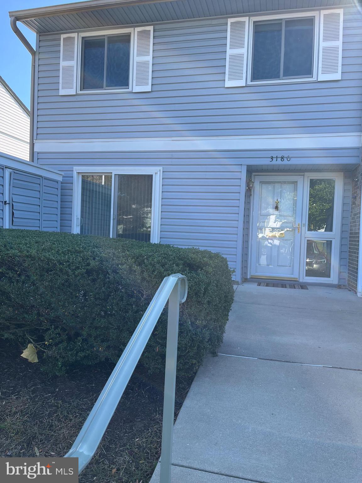 This fully renovated split-level condo is a gem. A new sunroom with custom drapes, new windows with cellular blinds, a new HVAC system, a new chair lift to the second level, and new hardwood floors throughout make this condo turn-key ready. The first level features a dining room, living room, kitchen, half bath, and screened in porch. The second level features two bedrooms with fully renovated en-suite baths. All utilities and external grounds are covered by the monthly HOA. This is easy living.