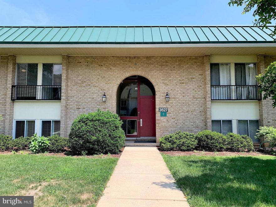 Welcome to Leisure World - Age 55+ Gated Community w/Many Amenities! Spacious Hampton Deluxe 
model Condo with 2-Bedrooms & 2-Baths on 1st floor with access from the front & back of the building! The building is especially close to the main clubhouse, walking trails, and the community entrance.  The foyer has a large storage closet and leads to the spacious living room and enclosed balcony with level access to outside. There is a  separate dining room. The owner's suite has an over-sized walk-in closet, plus a full bath with step-in shower. Full size Washer & Dryer in unit. The monthly condo fee of $808 covers all utilities. Easy walk to some of the many amenities include an 18 hole golf course, indoor & outdoor swimming pools, a free fitness center, plus a multitude of clubs and activities.