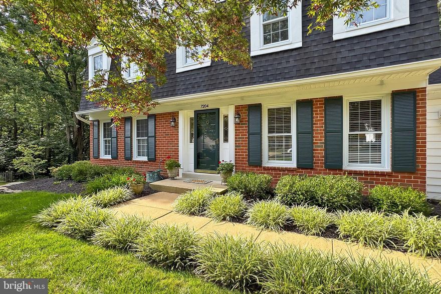 Price Improvement! Welcome to 7204 Ming Tree Court, a beautifully crafted Colonial nestled in the heart of Springfield’s Rolling Forest neighborhood. This 4-bedroom, 3.5-bath residence offers a harmonious blend of traditional elegance and everyday comfort, all set in a location that makes both commuting and unwinding a breeze. The exterior greets you with a stately brick façade, a spacious two-car garage, and thoughtfully designed landscaping featuring stacked stone accents, a generous multi-level deck, charming picket fencing, and a backdrop of serene wooded acreage.
Tucked into a serene corner of Northern Virginia, this home offers the perfect balance between tranquility and vibrant energy. While the neighborhood provides a quiet retreat, it’s just minutes from key commuter routes like the Fairfax County Parkway, I-95, Express Lanes, and the Springfield/Franconia Metro, making daily travel effortless. Fort Belvoir, the NGA site, and the Mark Center are all within easy reach, adding to the convenience. For those who love to explore, Springfield Town Center delivers an exciting mix of shopping, dining, and entertainment, while nature lovers will find peace wandering the untouched beauty of Pohick Creek Stream Valley Park. With timeless elegance, refined craftsmanship, and thoughtful design throughout, this residence is more than just a place to live—it’s a place to thrive.