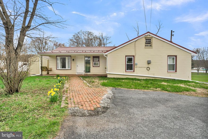 Welcome home to this charming 3 bedroom, 1 bathroom home sitting on nearly a FULL ACRE - something you almost never find at this price… especially in Cocalico School District! Step inside and you’ll immediately notice the inviting feel of the home! Featuring a bright and comfortable living room, updated flooring, and plenty of natural light throughout. The spacious eat-in kitchen offers great functionality with ample counter space, unique rustic wood accents, and room for gathering - perfect for everyday living or entertaining. The bathroom has been thoughtfully updated, and all three bedrooms provide cozy, flexible space for family, guests, or even a home office. The best part -  the land! Endless opportunities await for you, such a gardening, animals, or simply just the dream hosting space! Also outside, you will find the detached garage. This home is just ready for you to make it your own!! Properties like this don’t come along often - schedule your showing before it’s gone!