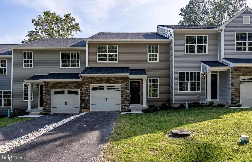 Welcome to 6 Graham Drive 2020 Townhome located in The Enclave at Bell Tavern on a private cul-de-sac in the Award-winning Downingtown Schools, offering the STEM program that other schools do not. This home feels much larger than posted pub records of 1920 sq ft. Entry from the open front porch into the foyer, 2nd floor stairwell to the right of entry. Coat closet, inside garage access to electric gar opener, powder-room, door to finished basement. Open floor plan for the living room, dining area, and kitchen. The kitchen offers stainless steel appliances: refrigerator, gas range, microwave, g/d and dishwasher. 42" gray and black cabinets, granite countertops, and pantry, recessed lighting, and breakfast bar space for 4-5 stools. The great room with a properly placed corner gas f/p, atrium door onto composite rear deck with stairs to the rear yard. Lots of natural light. 
The upper level offers a lg primary bedroom, huge walk-in closet and additional 2nd closet. Generous sized full main bathroom with double vanity and stall-shower. Two additional bedrooms are larger than most, and the closet space is double in size for most secondary bedrooms. Hall bathroom with tub bath. 2nd floor laundry room saves one from many extra steps. Incredible huge fully finished basement. The basement hallway is wide enough to have a mini office space. Lg closet under the stairs. At least 550-600 sq ft. of additional living space and storage. One-car garage and extra parking on the driveway. The usable living space in this home is very deceiving. 1st floor hardwood flooring, 2nd floor is carpeted, and engineer flooring in basement. Plenty of recessed lighting t/o. The finished basement adds a versatile finished area to use as you like including bedroom as there is an egress window.  Wonderful cul-de-sac community with ample overflow parking. Wegmans shopping center less than 2 miles. Close to additional shopping, entertainment transportation and parks.

15.2 x 12.2 mbr carpet c/f  walkin closet & huge walkin,  

13.2x14.3 br on right c/f lg walkin closet 

11.3x12 boys br c/f huge closet 

2nd full hall bathroom, side by side lndry

11.8x 23 great room gas f/p atrium door to deck 
10x10.7 kit bar for 5-6 stools
13.5x8.5 dining area- table for 6
Composite deck with stairs to yd
22.8 x22 fin basement separated by br rec area add office area in hallway by stairs