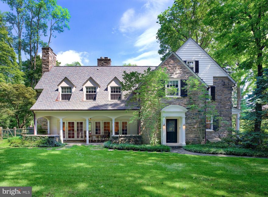 You can't help but fall in love with this 6 bedroom, 4.1 bath Haverford gem on .82 lush acres featuring sprawling lawn for the kids and pets and a sparkling swimming pool for the entire family! The house currently offers two bright and roomy home offices on the top floor. These can also be used as additional bedrooms or together with the adjacent bathroom as a generous au pair suiteNestled amidst tall trees, the 3-story charmer is distinguished by a stone and shingle facade, lovely dormers, large covered front porch and blissful rear patios for enjoying the views and outdoors. The gracious entry foyer welcomes you in and reveals elegant details galore like beautiful hardwood floors, tasteful millwork, a graceful staircase, open arches and other fine architectural elements. The gorgeous great room with a desirable modern open living-dining layout, fireplace flanked by built-ins, and incredible wall of windows with glass-paneled doors to the front and rear oases affords a perfect setting for indoor-outdoor entertaining. The chef's kitchen is a knockout with extensive cabinetry, a center island with seating and granite top, sunny eat-in area with enough space to fit 8, pantry area and separate entrance. Relax and have movie nights in the nearby wainscoted family room brightened by windows on triple exposures. There's also a handsome wood-paneled den with a cozy fireplace for reading, watching TV or playing music plus its own access to outside, as well as a powder room. Comfort continues upstairs for family and guests with 5 bright, spacious bedrooms and 3 nicely tiled full baths occupying the second level. The master is serene for unwinding and generously-sized with a luxurious en-suite bath for freshening up. The third floor offers even more space and versatility with built-in hallway storage, a large bedroom with abundant closets , a full bath and 2 home offices. The partially-finished lower level with exposed wood beams and a fireplace extends the possibilities with a great recreation room, media/family room, and lots of storage space. Take the party outside to your private rear paradise enveloped by nature, with a fabulous pool and patios for lounging, barbecuing, al fresco dining, summer swims and sports on the lawn! Minutes away from this prime location are top-rated schools and a wide assortment of shop, eateries, parks and conveniences. The house received a new Grand Manor roof and top of the line Marvin double pane windows in 2016 to ensure peace-of-mind and a comfortable living environment in all seasons.