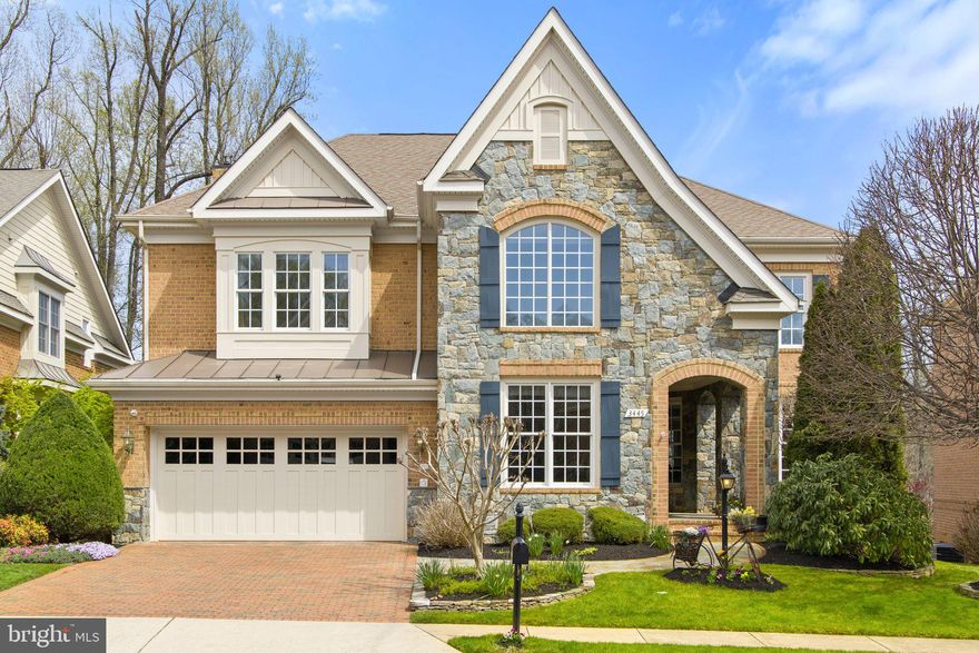 Welcome to 3445 Preservation Drive, an exceptional home backing to wooded common area with stunning views and a professionally landscaped yard with koi pond. The Innsbrook plan is large with an open floor plan and numerous upgrades, perfect for entertaining. Tall windows and 9' to 18’ ceilings flood the home with light. Luxury features include hardwood floors, chef's kitchen, family room with fireplace, library with custom cherry wood built-ins and two-story living room. The lower walkout level is huge with a large recreation room, theater area, separate exercise room, 5th bedroom and full bath. An outdoor deck stretches almost the full width of the house and has convenient stairs down to a brick paver patio.
Located in  Pickett’s Reserve,  a uniquely beautiful community of semi-custom homes, ideally located on the eastern edge of Fairfax City, just a few miles from the Vienna Metro, 495, 66, Tysons Corner, The Mosaic District and Fairfax Inova Hospital. 
With a land plan that emphasizes curvilinear streets & sidewalks and with an abundance of landscaping and street trees, the natural setting is complemented by the varied architecture of 88 homes. Community paths wind through stone gazebos and lead to an adjacent 15 acres of Fairfax County parkland. In addition, the 40 mile Cross County Trail can be accessed at the community ball fields just a short distance away. 
All homes are built with 4 sides brick or brick & stone.  Brick extends to the driveways, crosswalks and lead walks. The large variety of house types and facades is not often found in newer communities and definitely sets Pickett’s Reserve apart from other “cookie cutter” neighborhoods.