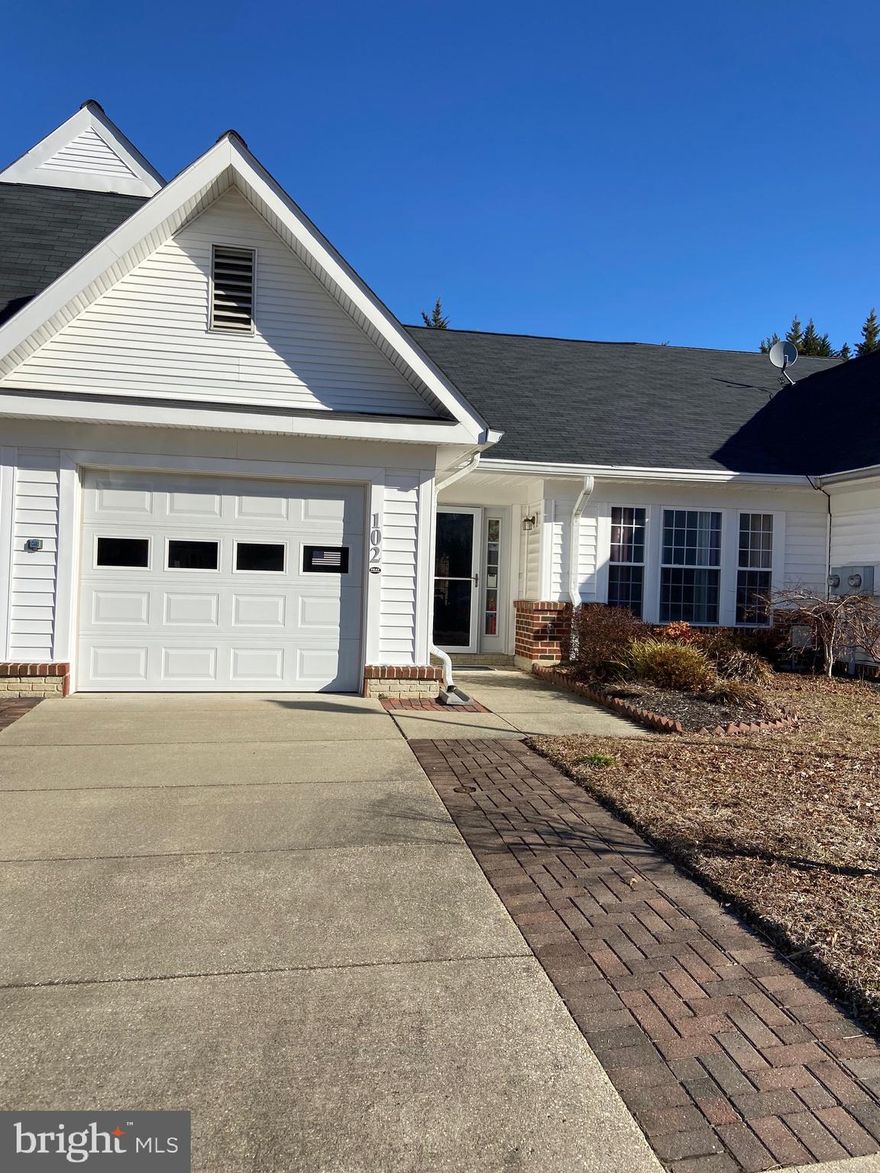 What a value for an over 55 community. 2 bedroom, 2 full bath, family room & dining room with vaulted ceilings and lots of windows. New carpet thru out. Large brick patio with electric awning off of the family room. 1 car garage with opener.