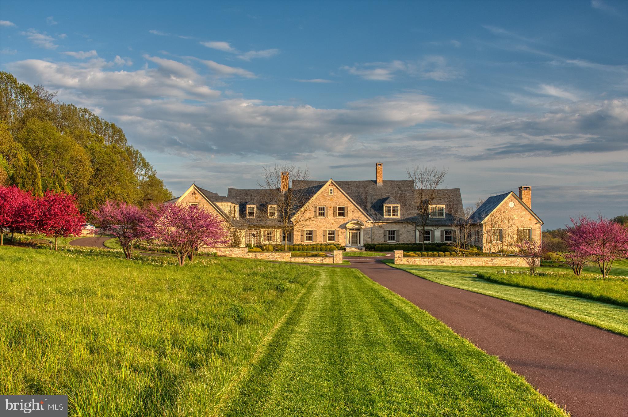 This expertly crafted Chester county estate is prized for its rolling hills and scenic landscapes. Built by local renowned builder Griffiths Construction, Wind Hill is a 60-acre sanctuary inviting you to escape to an extraordinary lifestyle. A 5-bedroom main residence with primary suite on the first level is supported by a guest home, independent office and magnificent barn. Worlds away yet easily accessible from the Eastern States and major city centers by rail or road.