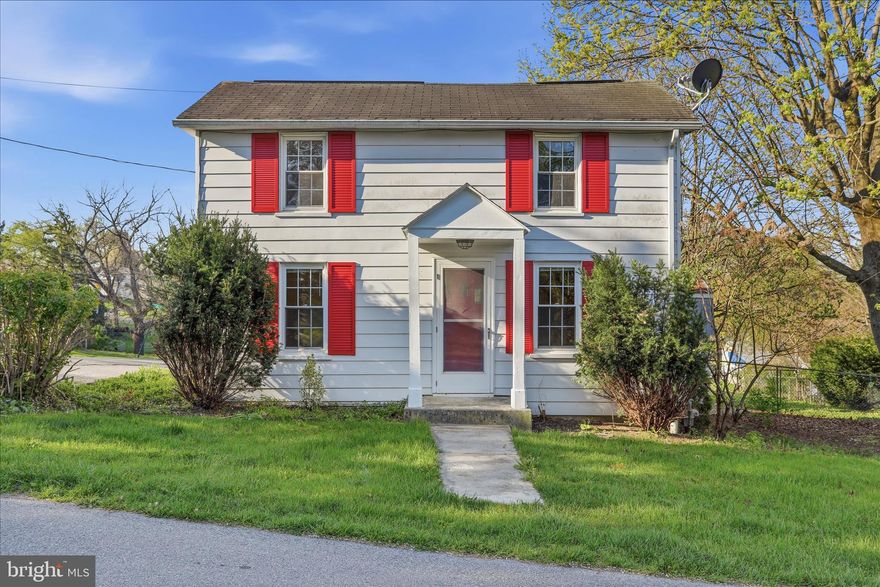 This home is newly painted and carpeted so it is move-in ready and waiting for the right buyer!  This cozy colonial sits on a large corner lot that has a fully fenced backyard--perfect for pets, play or added privacy.  Outdoor features include a concrete patio with privacy fencing, a 2-car carport for off street parking, a detached garage/workshop with electricity, a concrete block storage shed for multiple uses and a cellar with bilco doors.  Inside the main level features a living room with a gas stove for heat, an efficient kitchen offers gas cooking & a dining area and an adjoining laundry/mudroom has extra storage & direct access to the outside amenities.  The upper level is carpeted and has 2 ample-sized bedrooms and full bath with a walk-in shower.  The larger bedroom also has a large walk-in closet for additional storage.  Bring your vision and see all the potential this charming home has waiting for you!