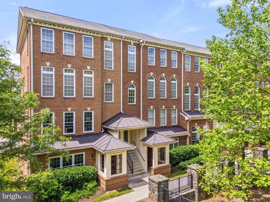 Open House Saturday, May 10th 11am-1pm! Step into refined living in this elegantly appointed townhouse-style condo nestled in the vibrant heart of Fairfax. The timeless brick exterior makes a lasting first impression, leading to spacious interiors where natural light cascades through large windows, illuminating every room with a warm, welcoming glow.

The main level offers a seamless flow between the living, dining, and family rooms, anchored by a dual-sided fireplace that creates an intimate ambiance for both casual gatherings and sophisticated entertaining. The gourmet kitchen is both functional and stylish, boasting gleaming granite countertops, rich cabinetry, and premium stainless steel appliances, all framed by a chic mosaic tile backsplash. A private balcony off the kitchen offers a serene outdoor spot for morning coffee or evening relaxation.

Upstairs, the primary suite provides a calming retreat with vaulted ceilings, a generous walk-in closet, and a spa-inspired bath complete with a soaking tub, glass-enclosed shower, and dual vanities. You will find two additional bedrooms, a second bath, and a laundry room on the upper level. 

This home is situated within walking distance to Whole Foods, an array of dining options, and shops, plus Costco, Target, and Walmart all within 1 mile for everyday convenience. For commuters, the location is unmatched – enjoy a hassle-free commute with the free shuttle to Vienna Metro or convenient access to the Fairfax Connector bus to DC.

Recent upgrades galore including the HVAC, primary bathroom, secondary bathroom, luxury vinyl plank flooring and kitchen! The  attached 1-car garage has added storage and the community has well-maintained community grounds providing the perfect blend of sophistication and practicality. Don’t miss your chance to see it in person – schedule a private tour today or visit the Open House.