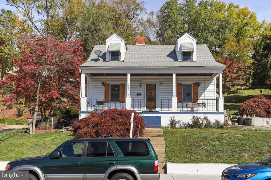 Cape cod situated on a 0.41 acre lot in the city of Brunswick! Featuring 3 bedrooms, 1.5 baths. Living room with hardwood flooring, built-in cabinets and fireplace with a wood-stove insert. Eat-in kitchen with gas stove. Main level bedroom. Two bedrooms and full bath on upper level. Unfinished basement with laundry and walkout stairs to yard. Roof, windows (except for 1), and water heater all new within the last 2 years. Selling as-is. Great mountain views from the large covered front porch! Convenient location near dining, shops, elementary school, Marc train station, and C&O Canal. Additional lot included. Schedule your tour today!