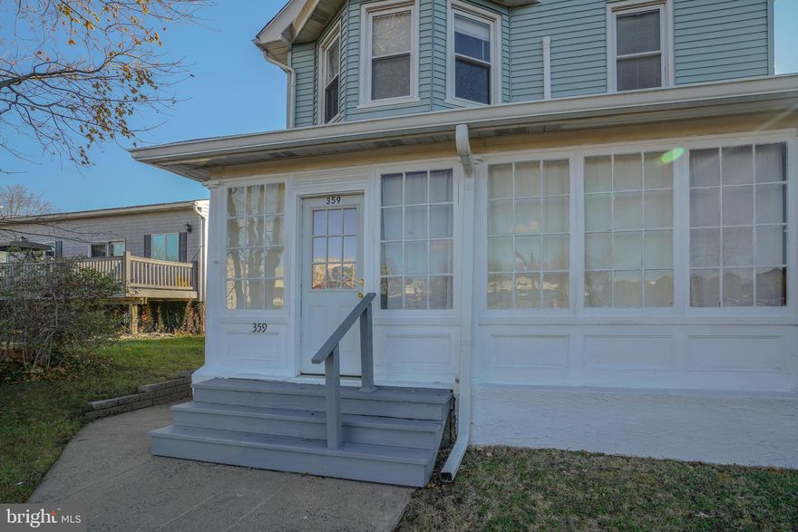 Just renovated!  Beautiful two bedroom one bath unit offering an ultra modern kitchen with granite counters, electric range, microwave, and refrigerator.  Spacious living room, formal dining room, and enclosed front porch. Plenty of off street parking!  Utilities included!